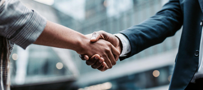 Business agreement handshake